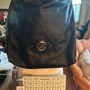 Michael Kors Black Leather bag and Jet set Travel clutch/w tag. Both New. 😘